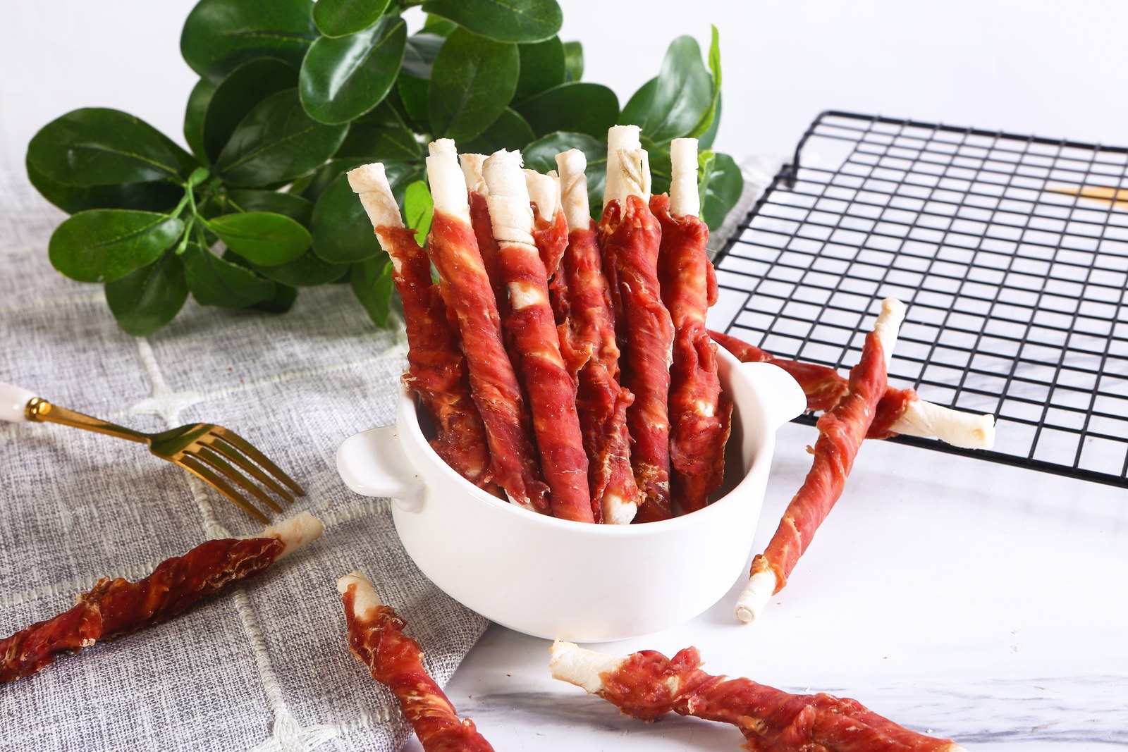 Duck-wrapped bovine rawhide roll