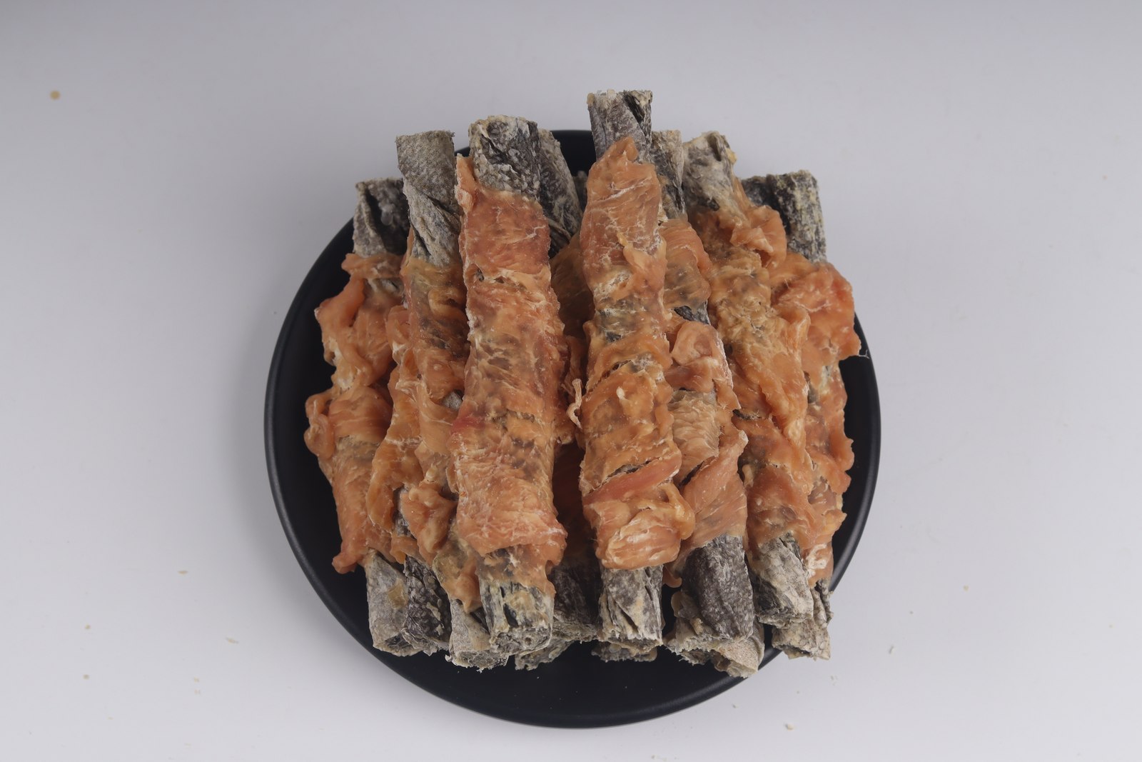 Chicken-wrapped cod skin